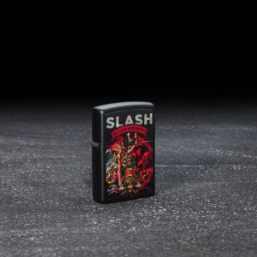 Lifestyle image of Slash Design Black Matte Windproof Lighter standing in a dark scene.
